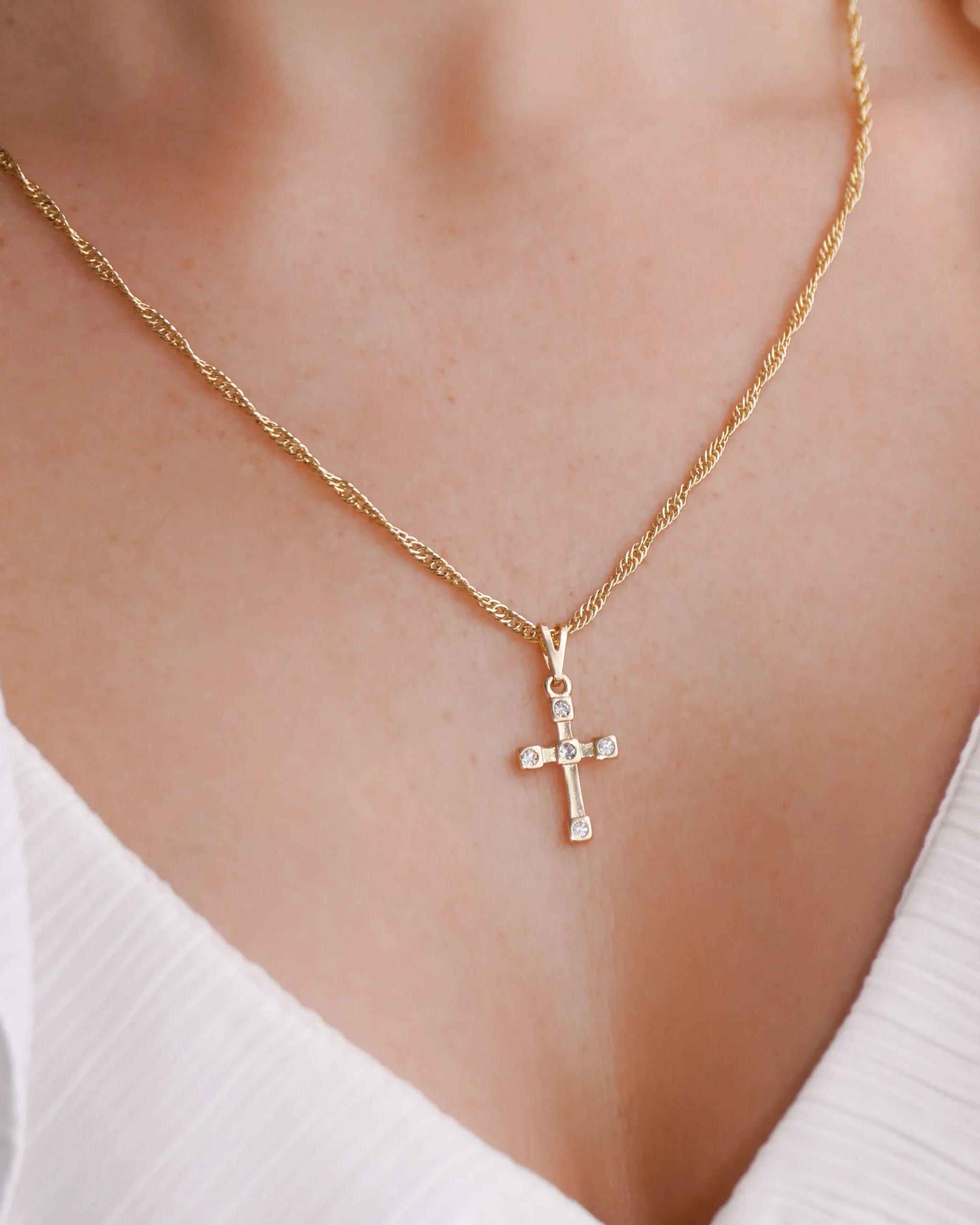 DIJE CRUZ MULTIPUNTO CRISTAL GOLD 1.7CM